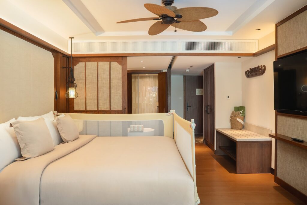 A bed barrier fitted along the bed in a Family Concierge suite