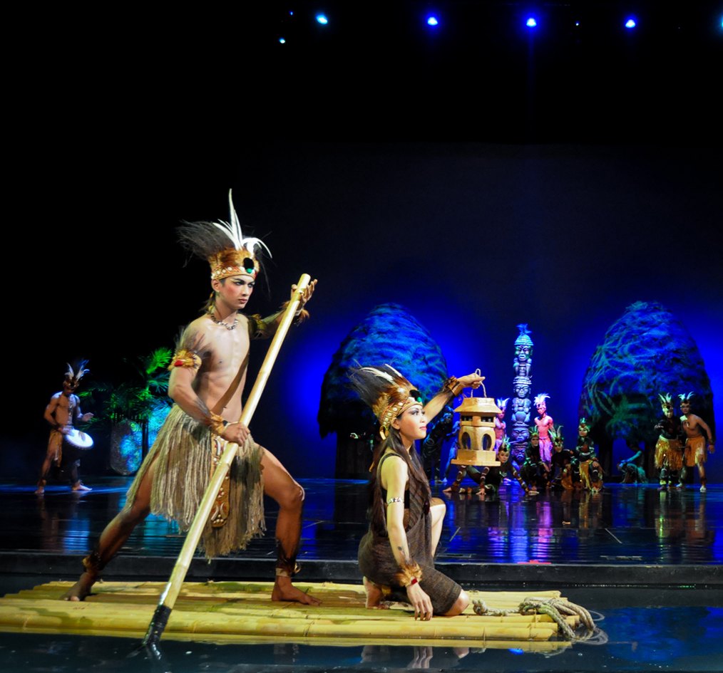 Dancers on a bamboo raft in the Devdan Show, Treasure of the Archipelago, in Nusa Dua