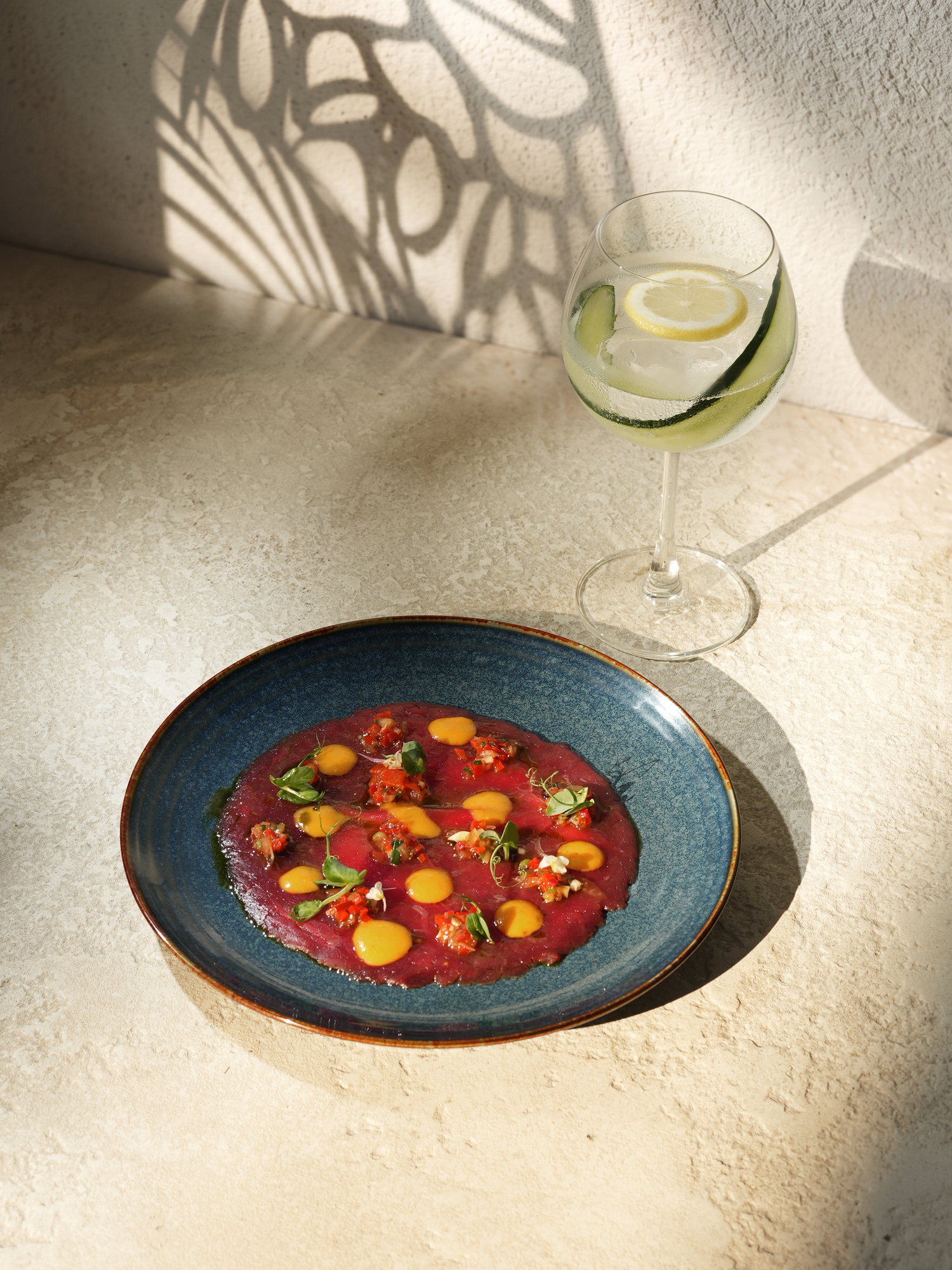 Beef carpaccio with pepper salsa and a citrus dressing at Kanna Beach, Paradisus by Melia Bali