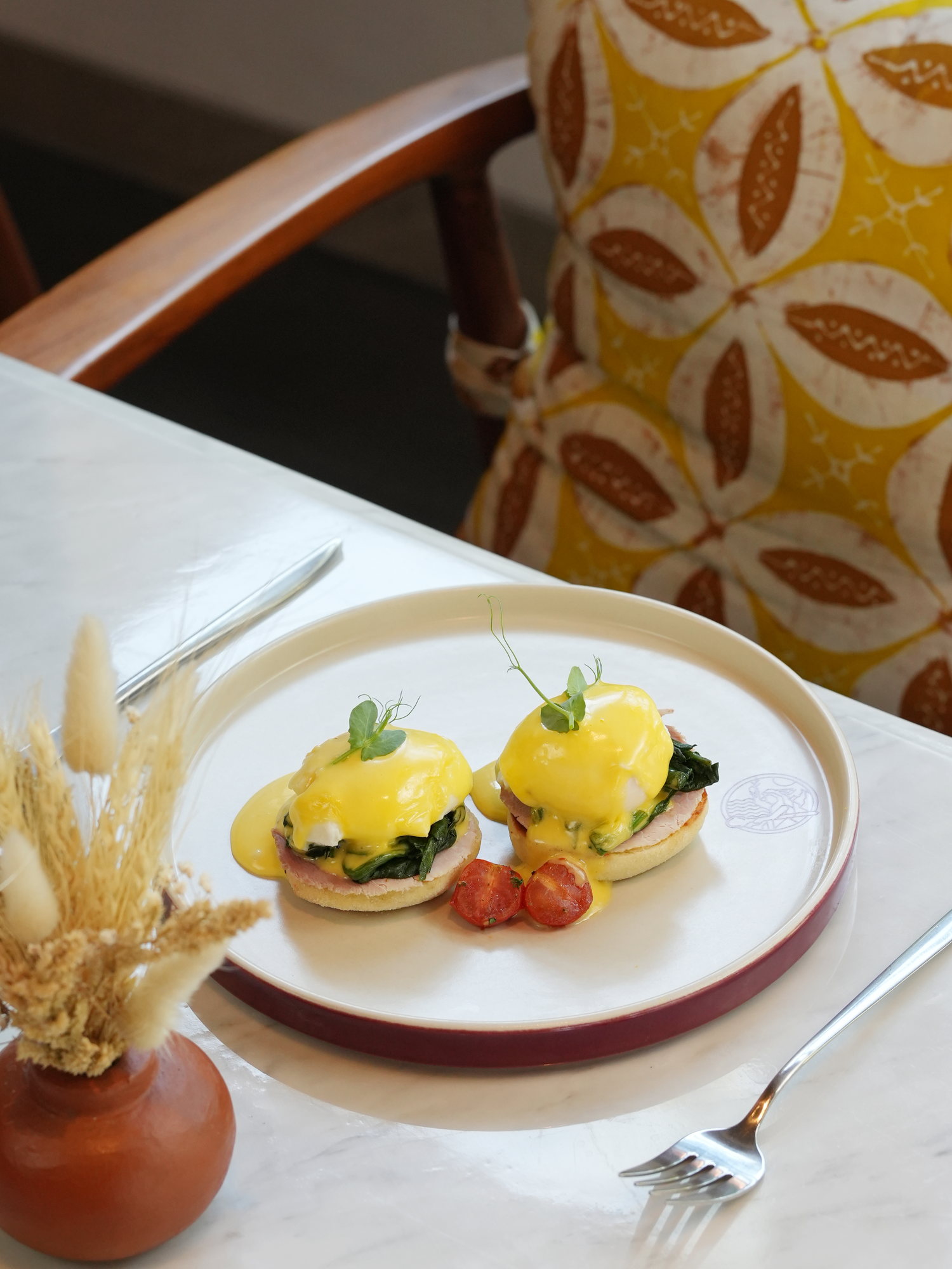 Eggs benedict with ham, spinach and hollandaise on English muffins at Peseta, Paradisus by Melia Bali