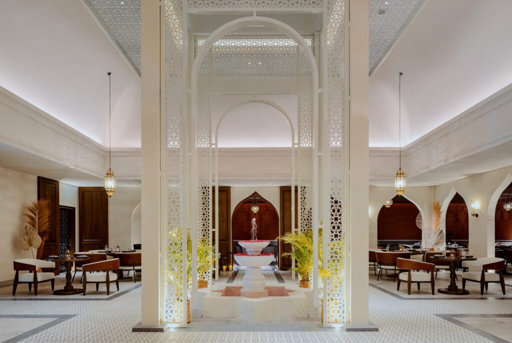 Samira Middle Eastern restaurant at Paradisus by Meliá Bali, white fretwork arches around a rose-petal fountain