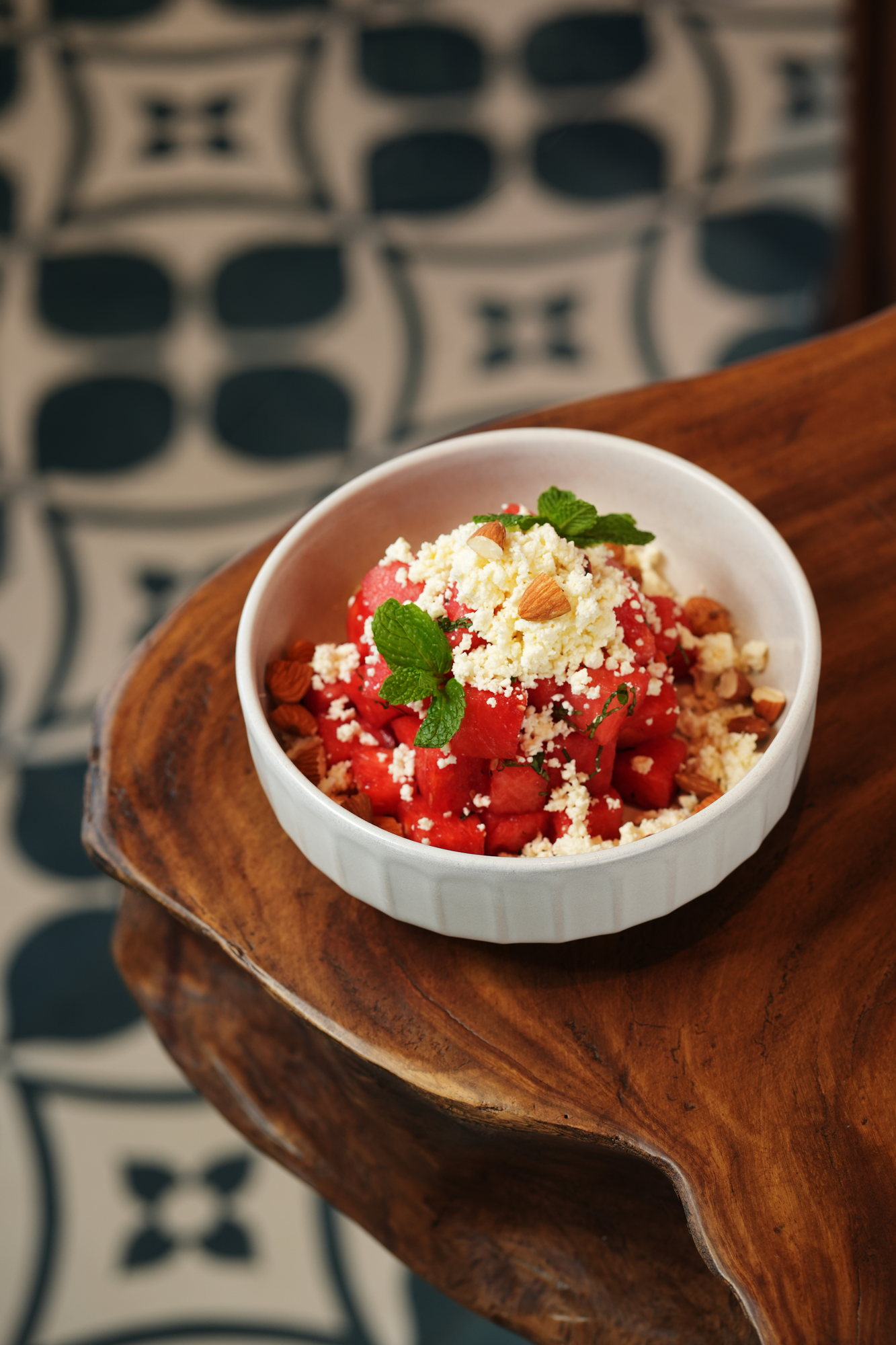 A watermelon salad with crumbled feta, toasted almonds and mint at Sante, Paradisus by Melia Bali