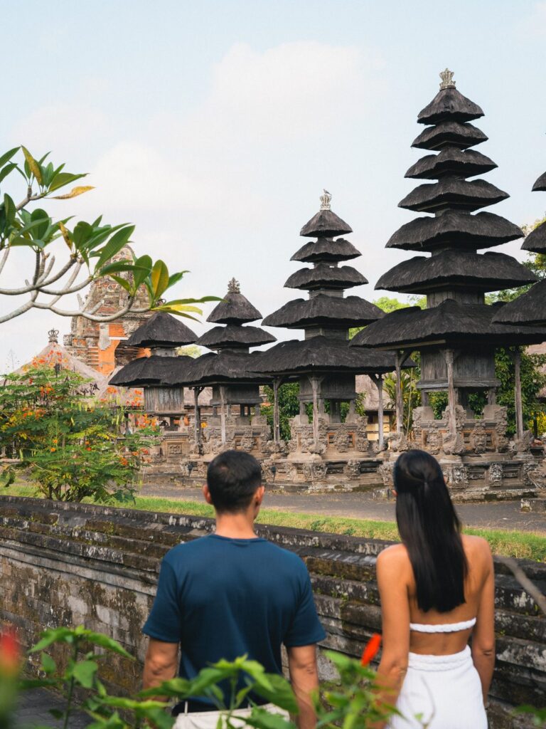 Guests looking at the tiered meru shrines of Taman Ayun Temple on the Destination Inclusive excursion from Paradisus by Meliá Bali