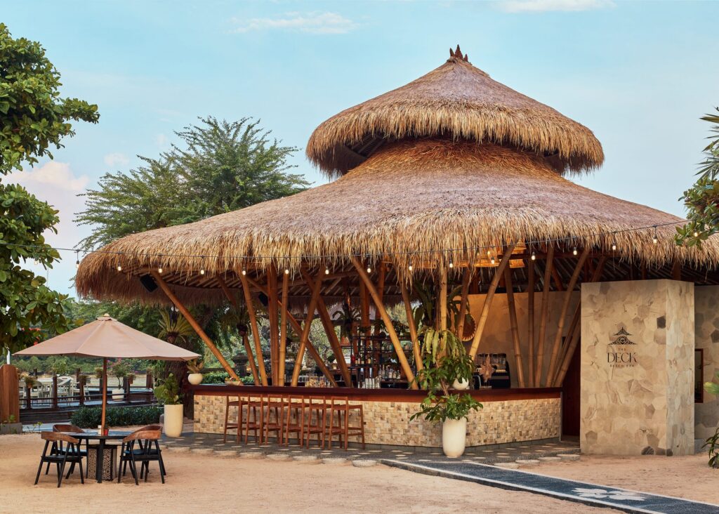 The Deck at Paradisus by Meliá Bali, timber sun deck and loungers between the pool and the beach
