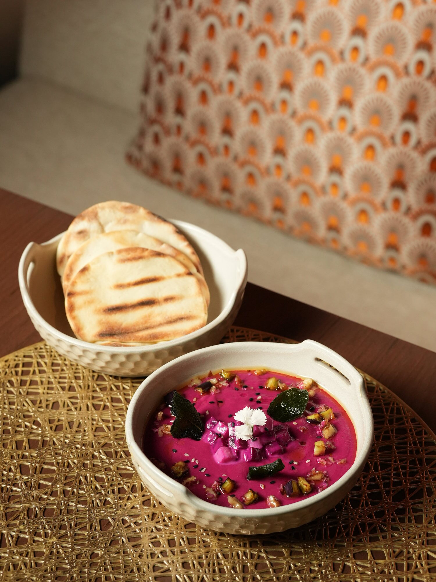 A beetroot dip with roasted aubergine, sesame and crisp sage, served with grilled pita at Samira, Paradisus by Melia Bali